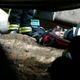 A simulated casualty waits on a stretcher.